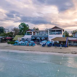 https://blue-skies-beach-resort.comcaribbean.com